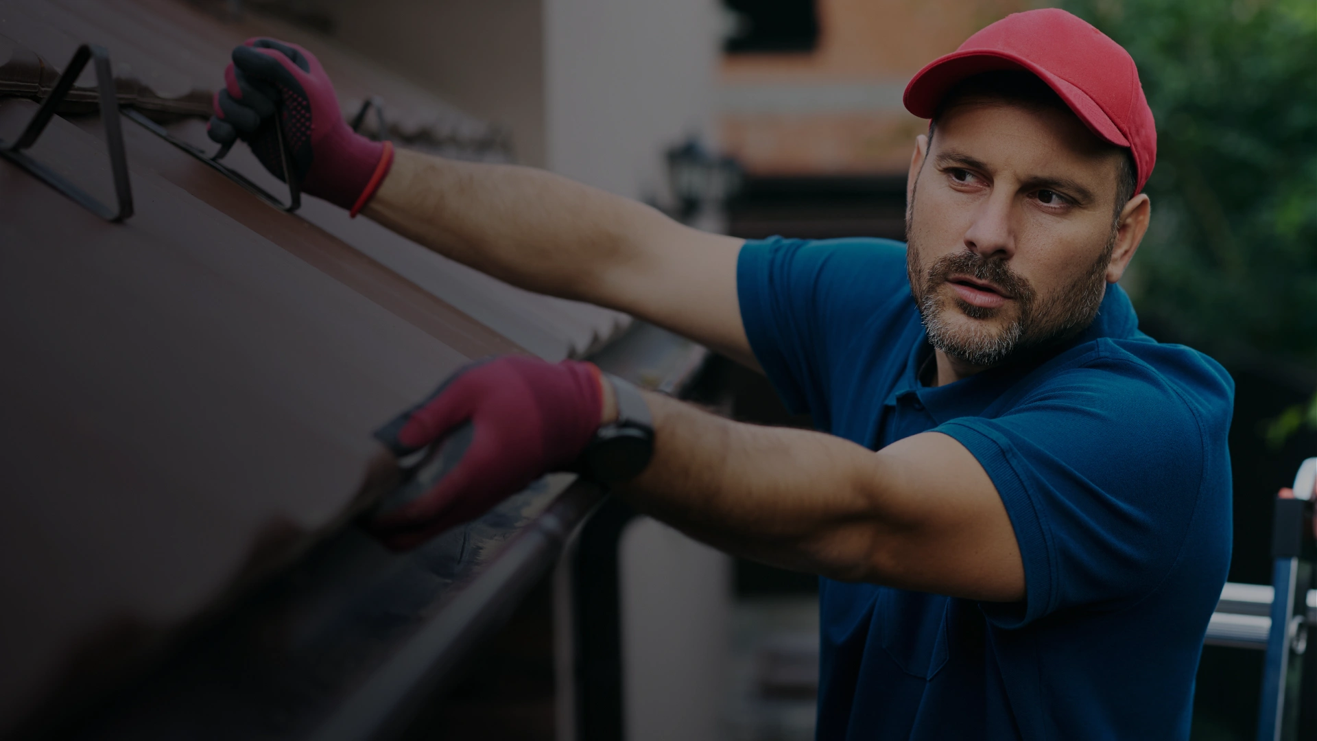 Professional plumber working on drain